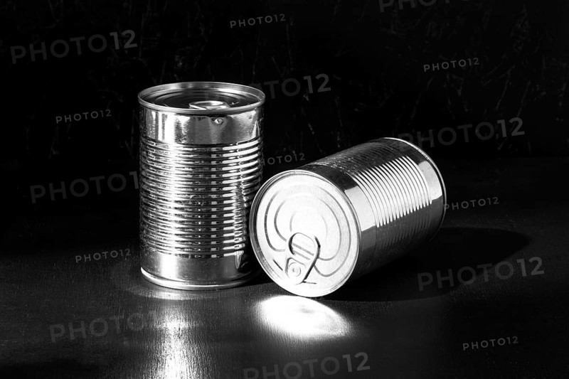 Silver tall round tin cans