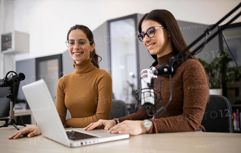 Smiley women broadcasting radio