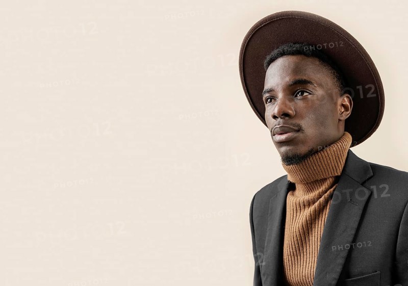 Young handsome man posing with hat 6