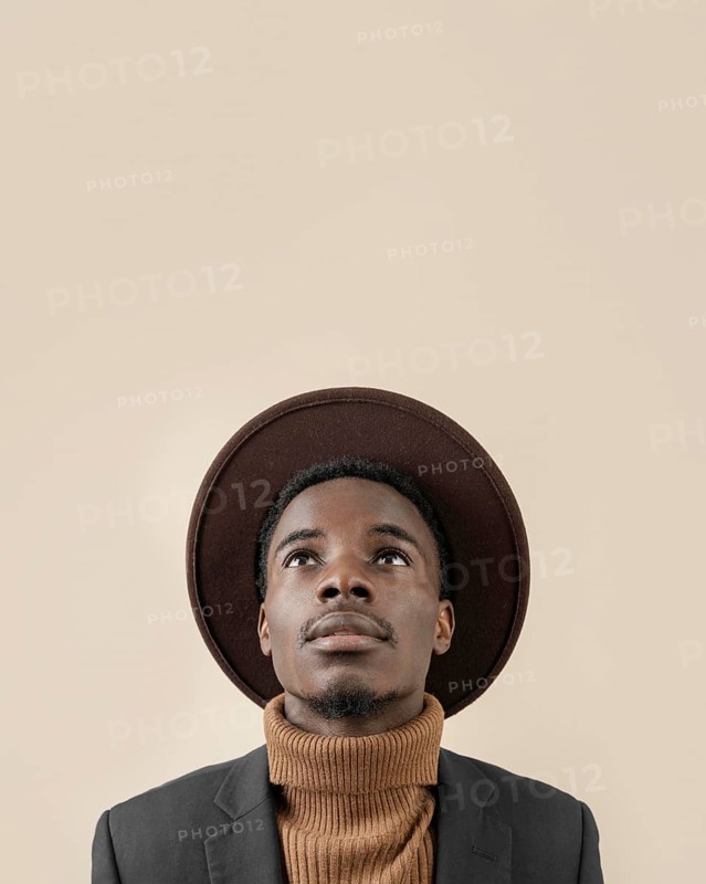 Young handsome man posing with hat 7