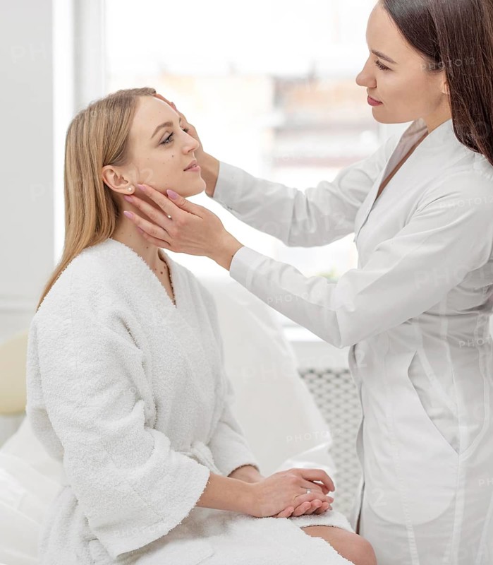 Beautician woman clinic consults client 3