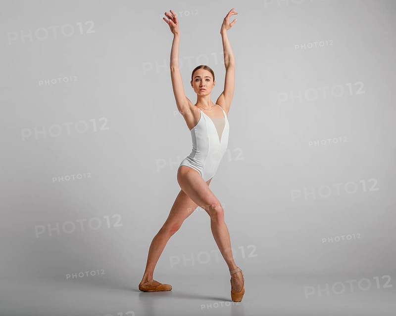 Beautiful ballerina posing full shot