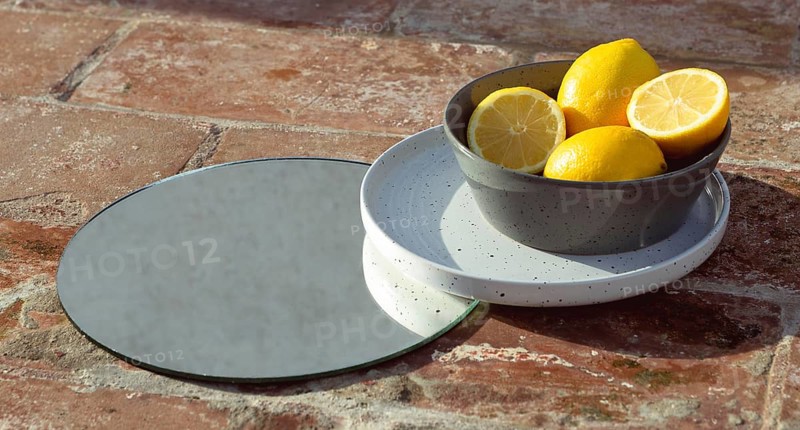 Bowl with fresh lemons