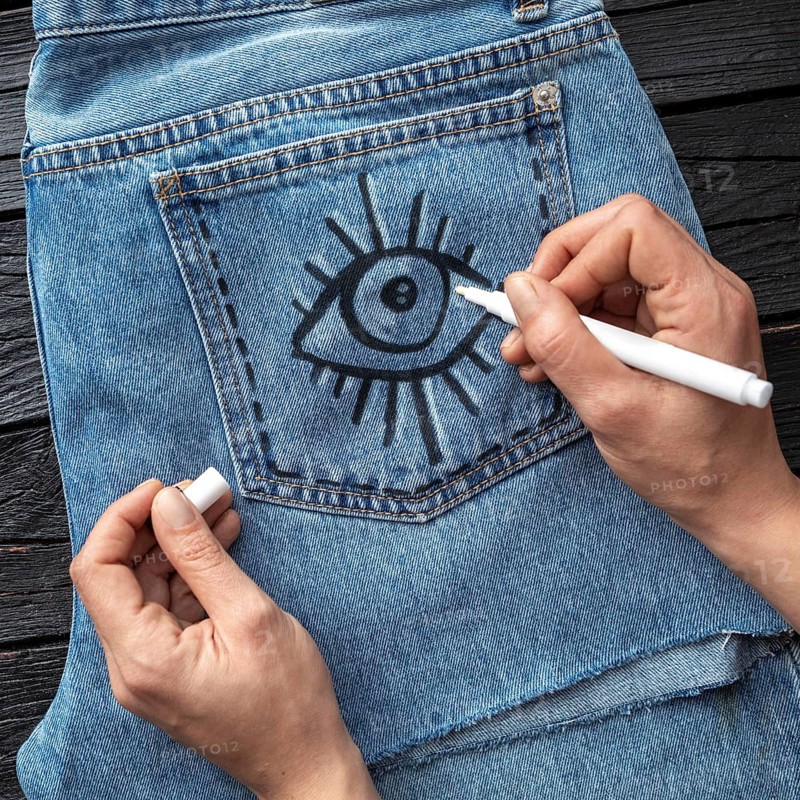 Close up hand drawing jeans