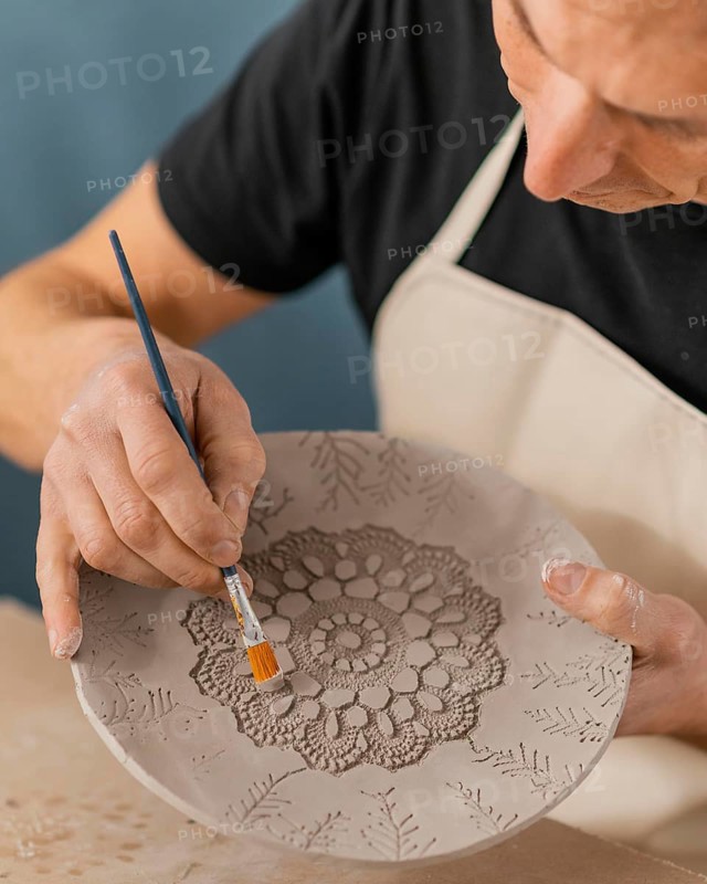 Close up man holding brush