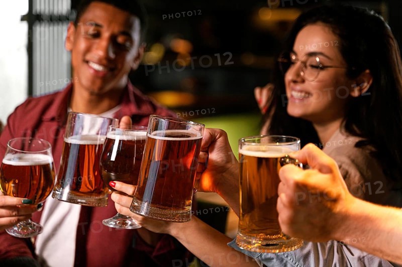 Close up people with beer