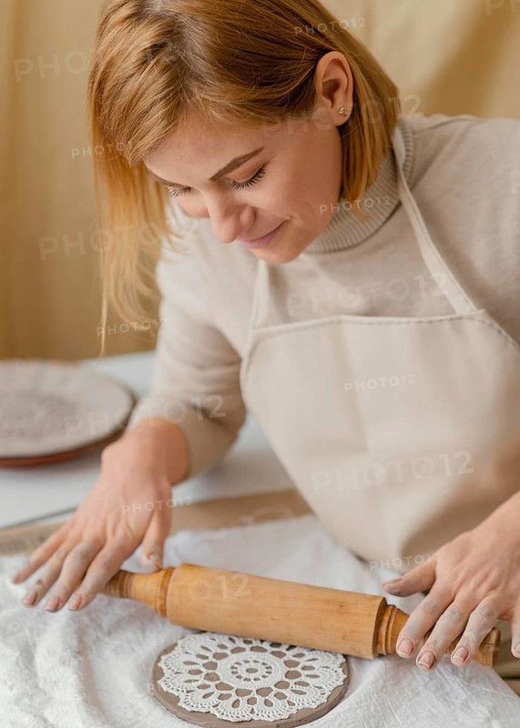 Close up smiley woman doing pottery 2