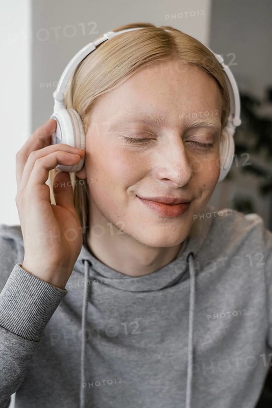 Close up smiley woman with headphones