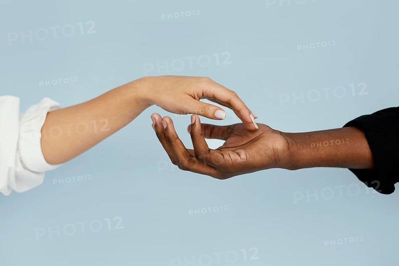 Close up white black hand