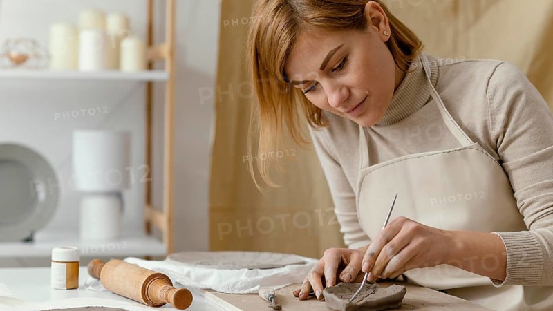 Close up woman making leaf