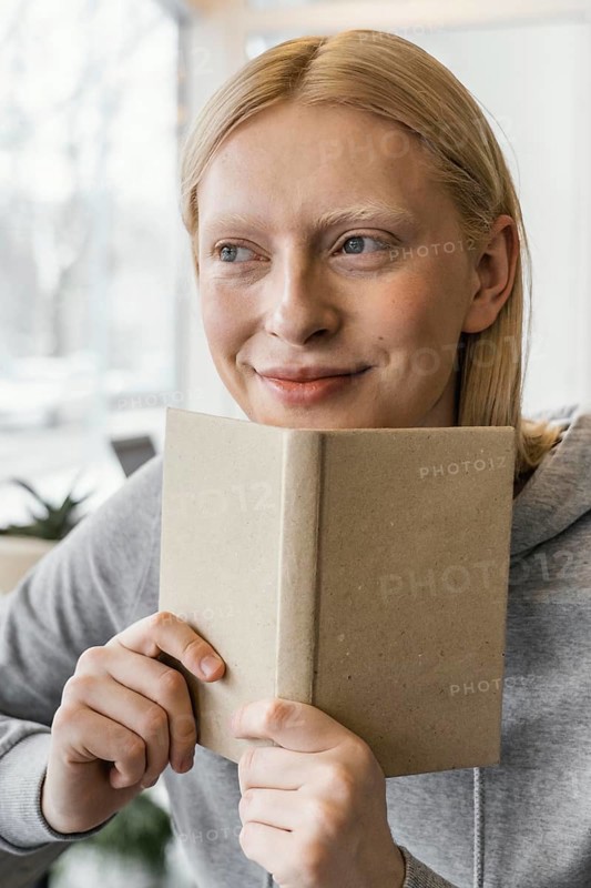 Close up woman with notebook