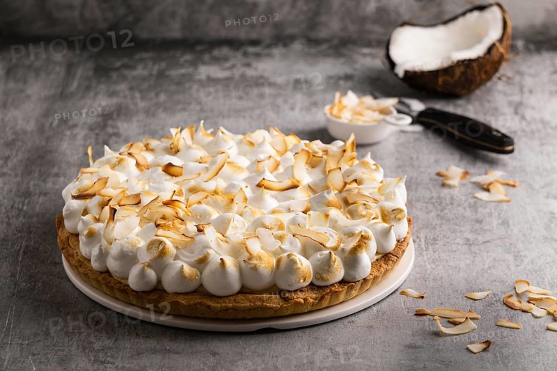 Delicious cake with coconut high angle