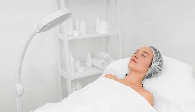 Female client salon face care routine with cleansing disks 2