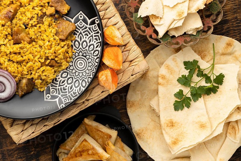 Flat lay meal with rice pita