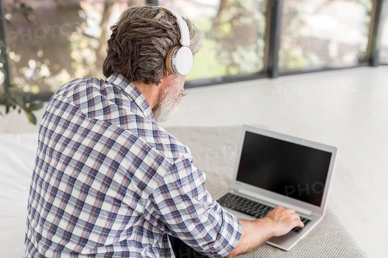 High angle teacher using laptop