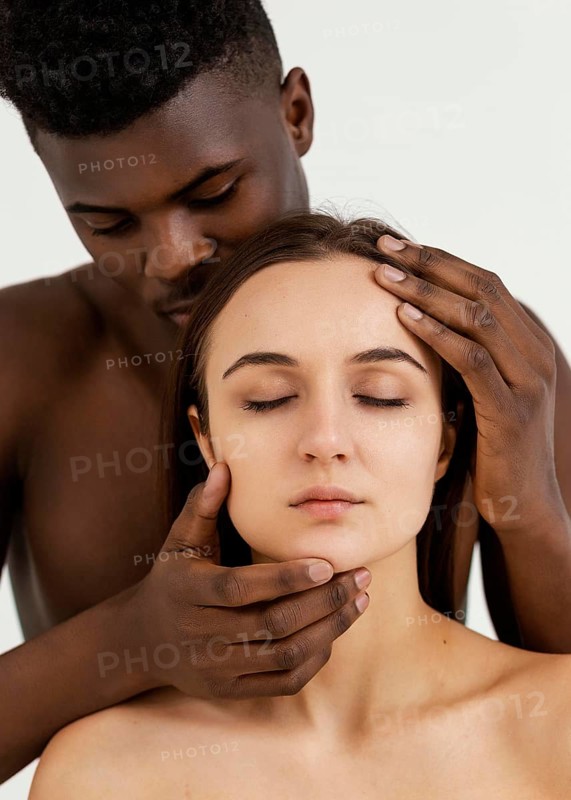 Interracial people posing together