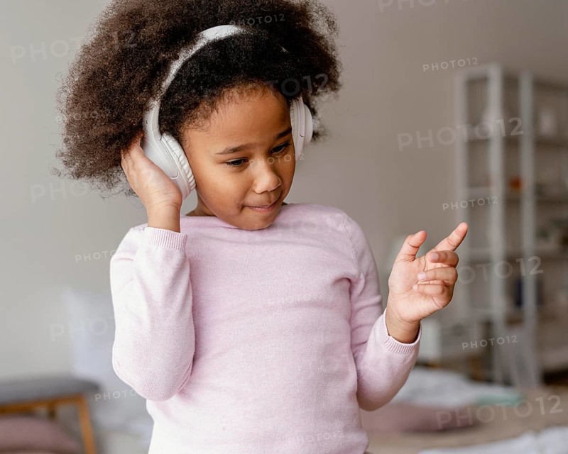 Little girl with headphones 4