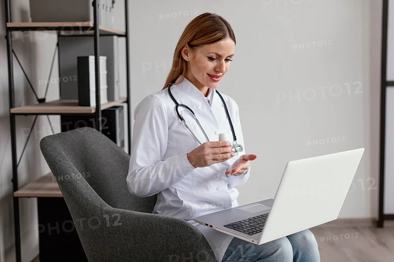 Medium shot doctor sitting chair
