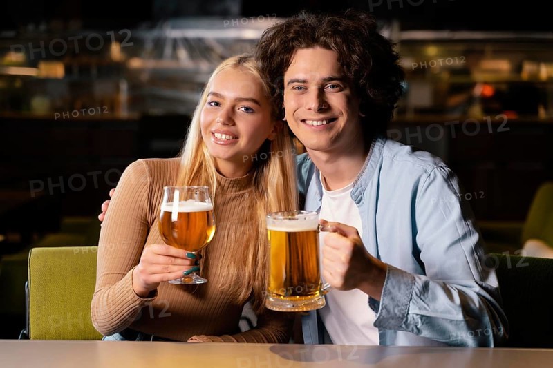 Medium shot man woman pub