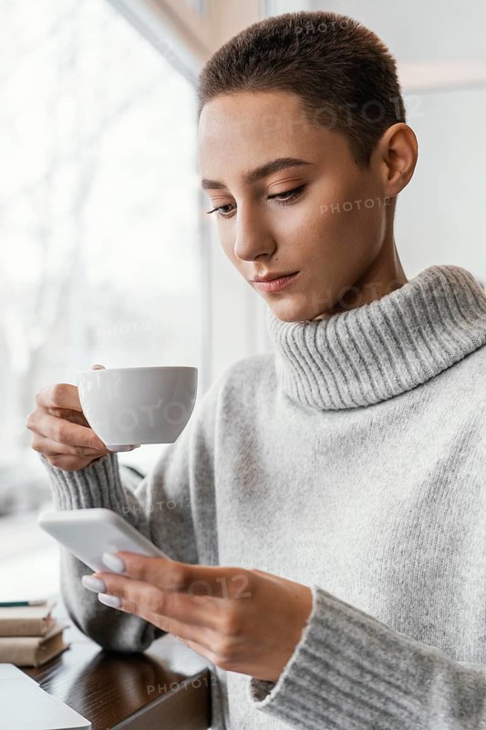 Medium shot woman holding cup 2