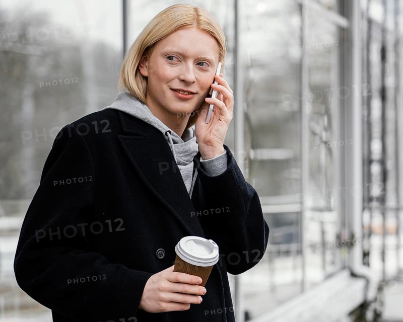 Medium shot woman with phone