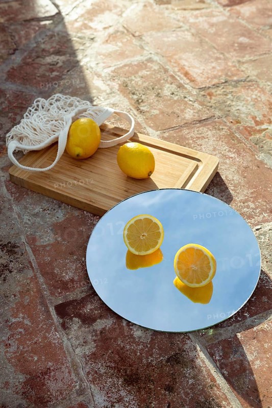 Mirror with fresh lemons