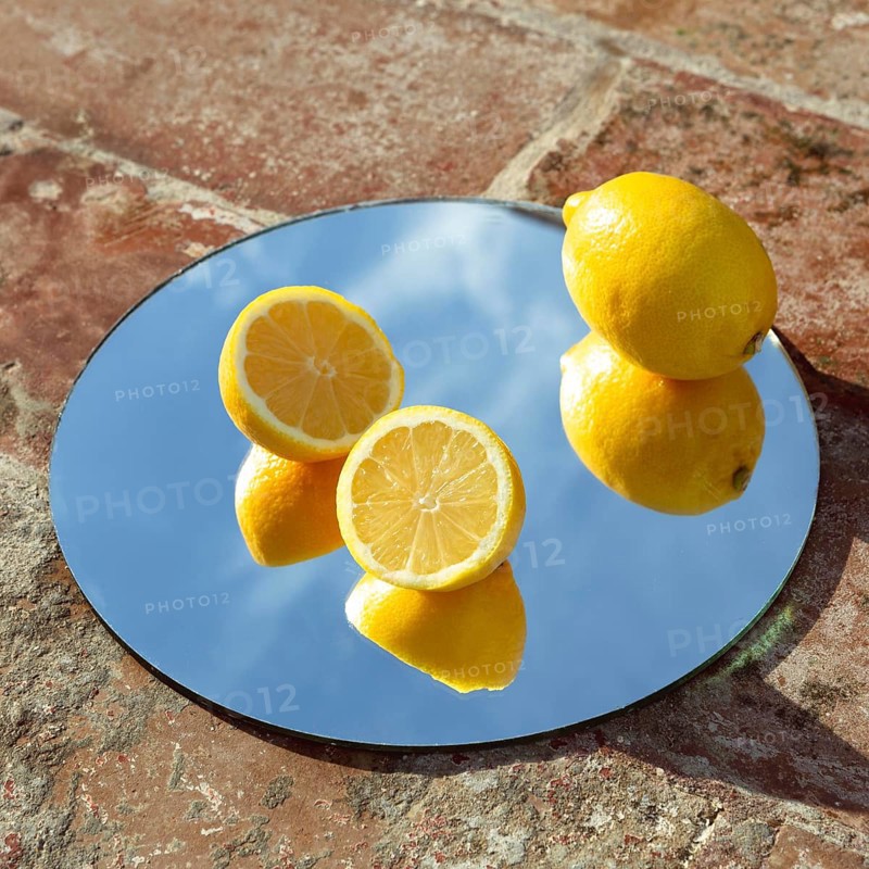 Mirror with fresh lemons 2