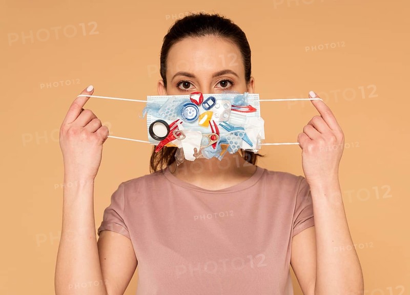 Portrait woman with craft mask