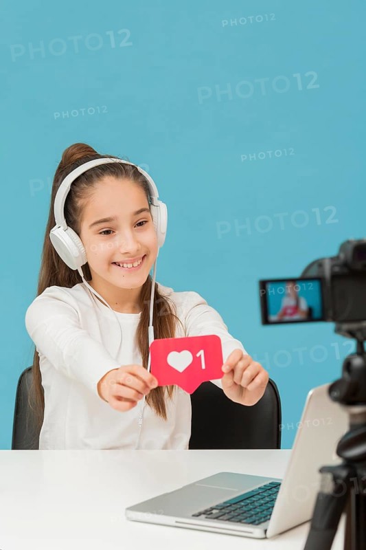 Pretty young girl happy record video