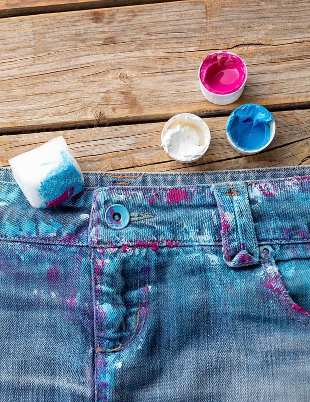 Top view colored jeans with paint
