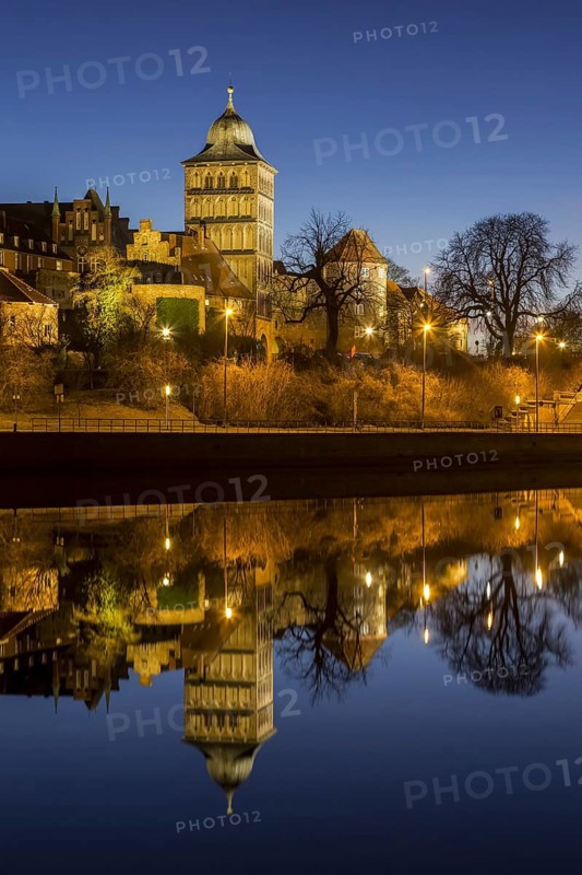 Gothic Burgtor Gate reflected in water of the Elbe Luebeck Canal