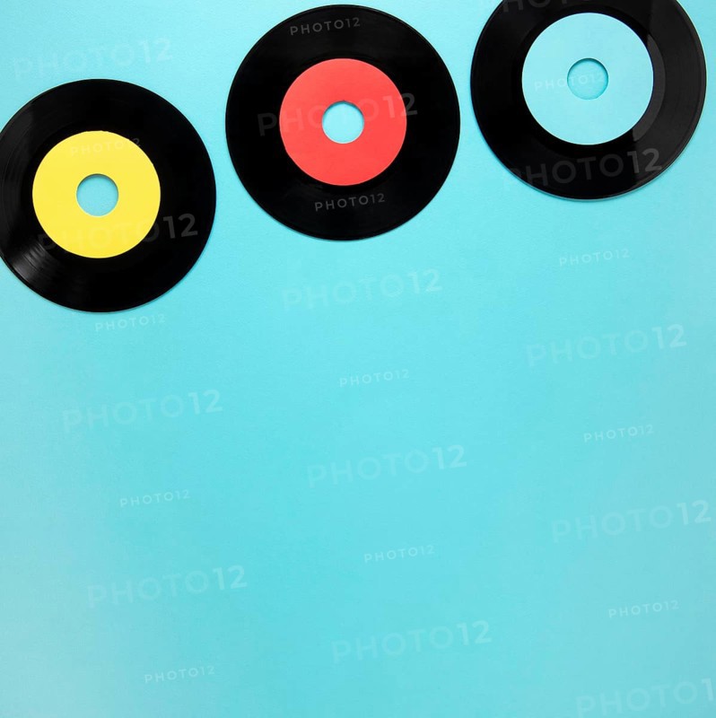 Old disc records blue background