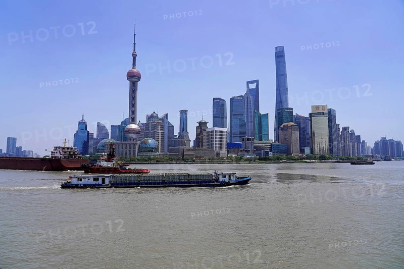View of the skyline from the Bund on the Huangpu River with Oriental Pearl Tower