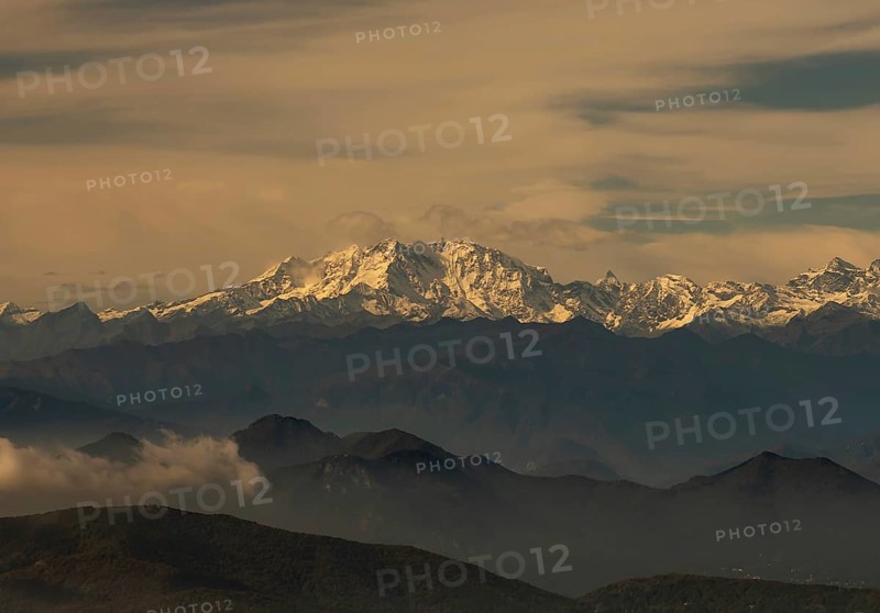 Aerial View over a Beautiful Mountainscape and And Snow Capped Monte Rosa and Mountain Peak Matterhorn and with Floating Clouds in a Sunny Day in Ticino