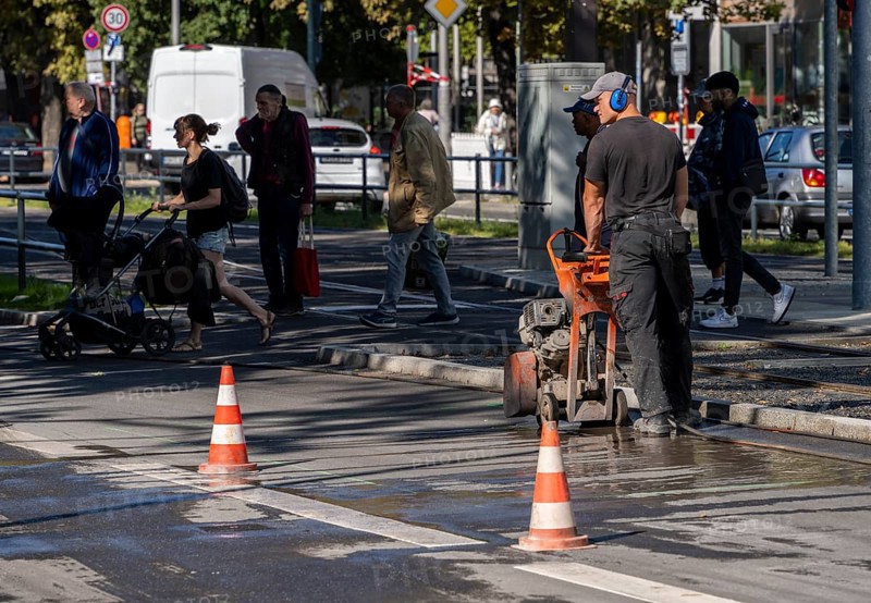 Road construction site next to a tram station