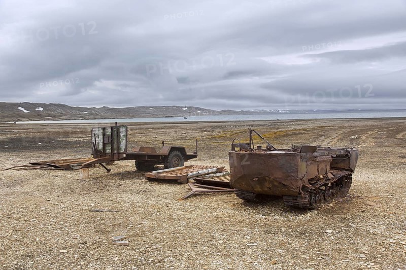 Rusty amphibian vehicle at deserted 1950s Kinnvika Arctic research station