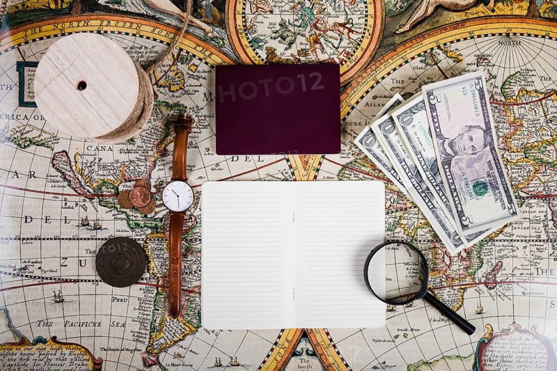 Passport diary with antique equipments world map