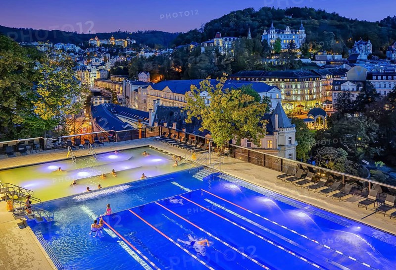 Outdoor terrace of the Terme thermal spa with panoramic view of the city at dusk