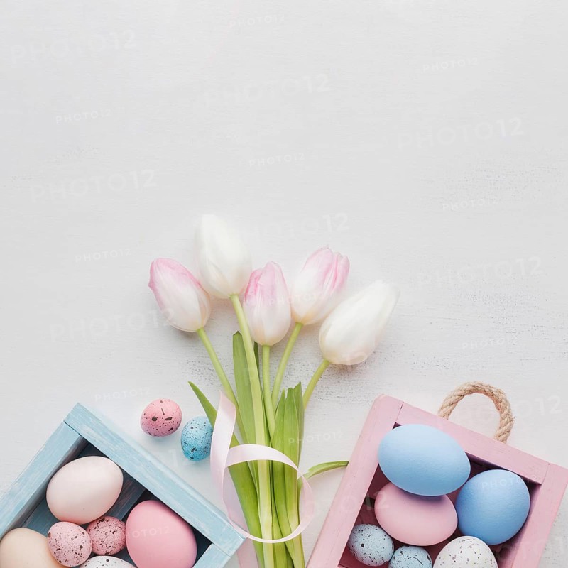 Top view cute boxes with colorful easter eggs bouquet tulips