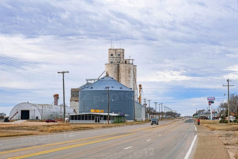 Silos connected to a grain elevator on a farm in the village Melrose in Curry County