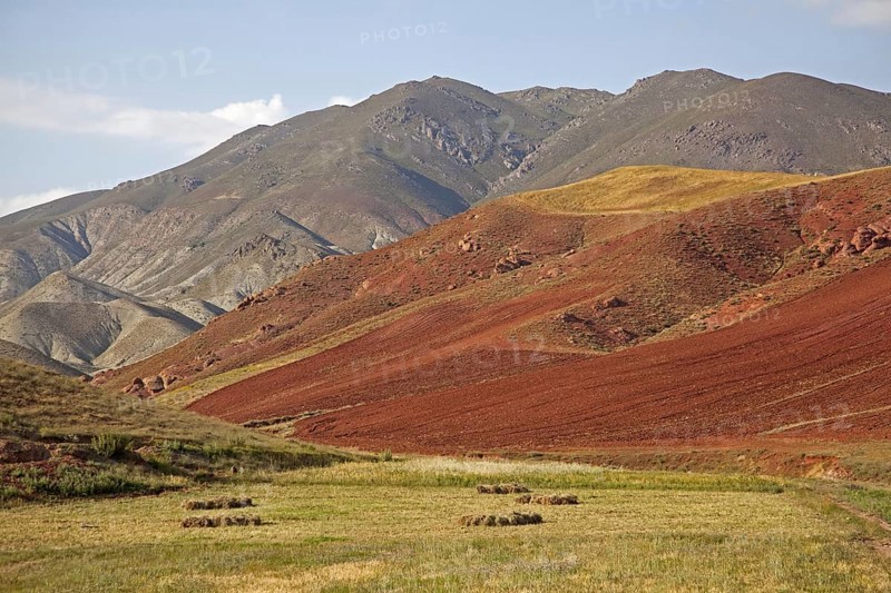 Colourful mountain slopes between Tabriz and Ardabil in Iran