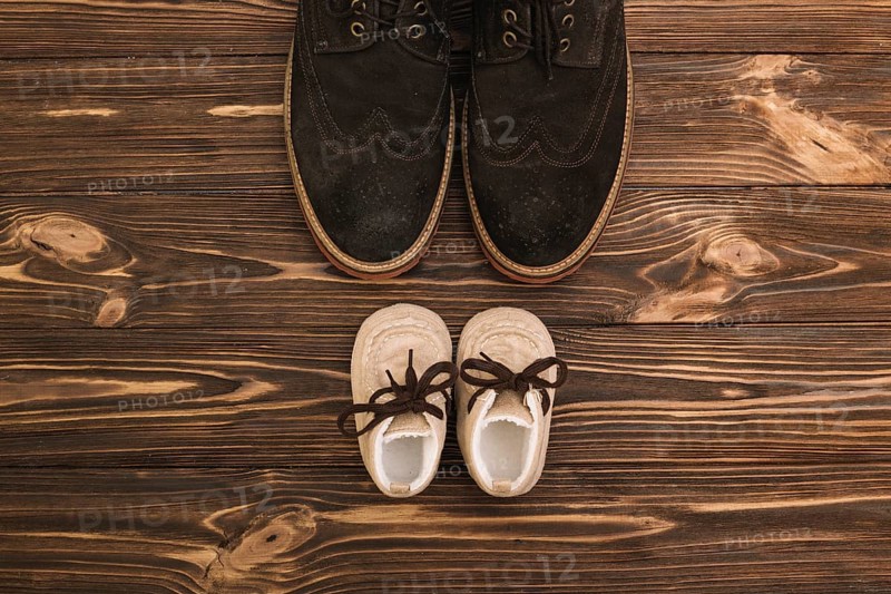 Male shoes near kid boots