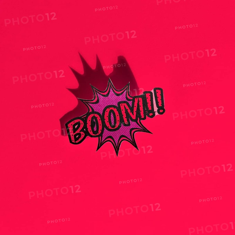 Boom comic text speech bubble pop art style sound effect red backdrop