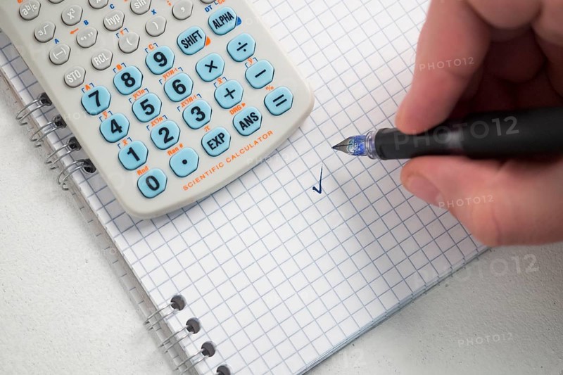 Hand writing with pen paper