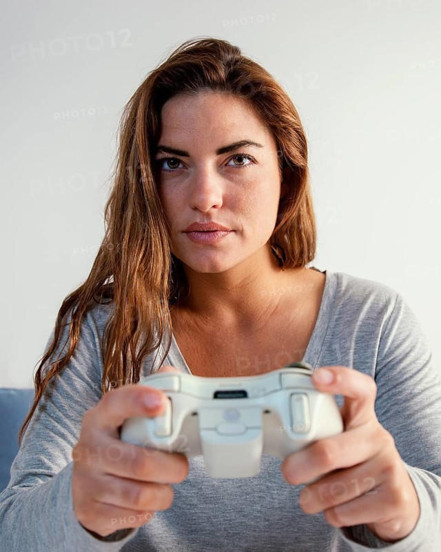 Woman playing joystick