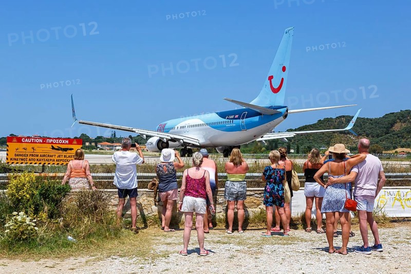 A TUI Boeing 737-800 aircraft with the registration G-TAWX at Skiathos Airport