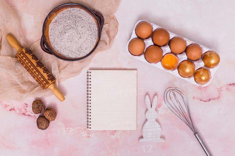 Gold easter eggs rack with notebook kitchen utensils rabbit