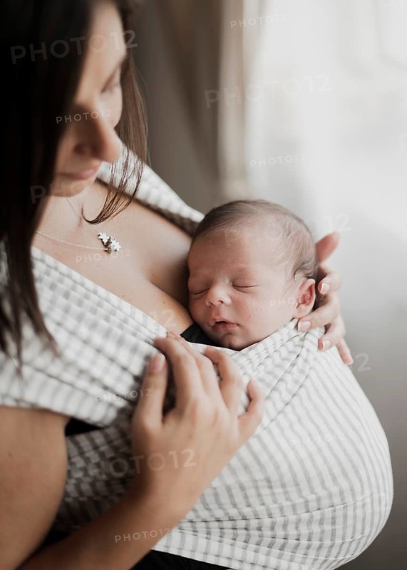 Portrait mother holding her little kid