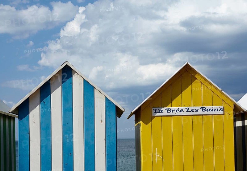 Colourful bathing houses on the beach at La Bree-les-Bains
