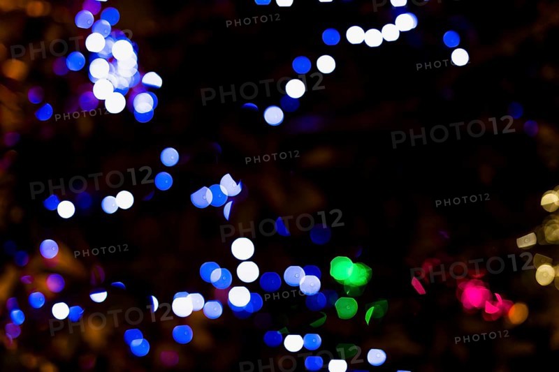 Illuminated color dot with darkness background